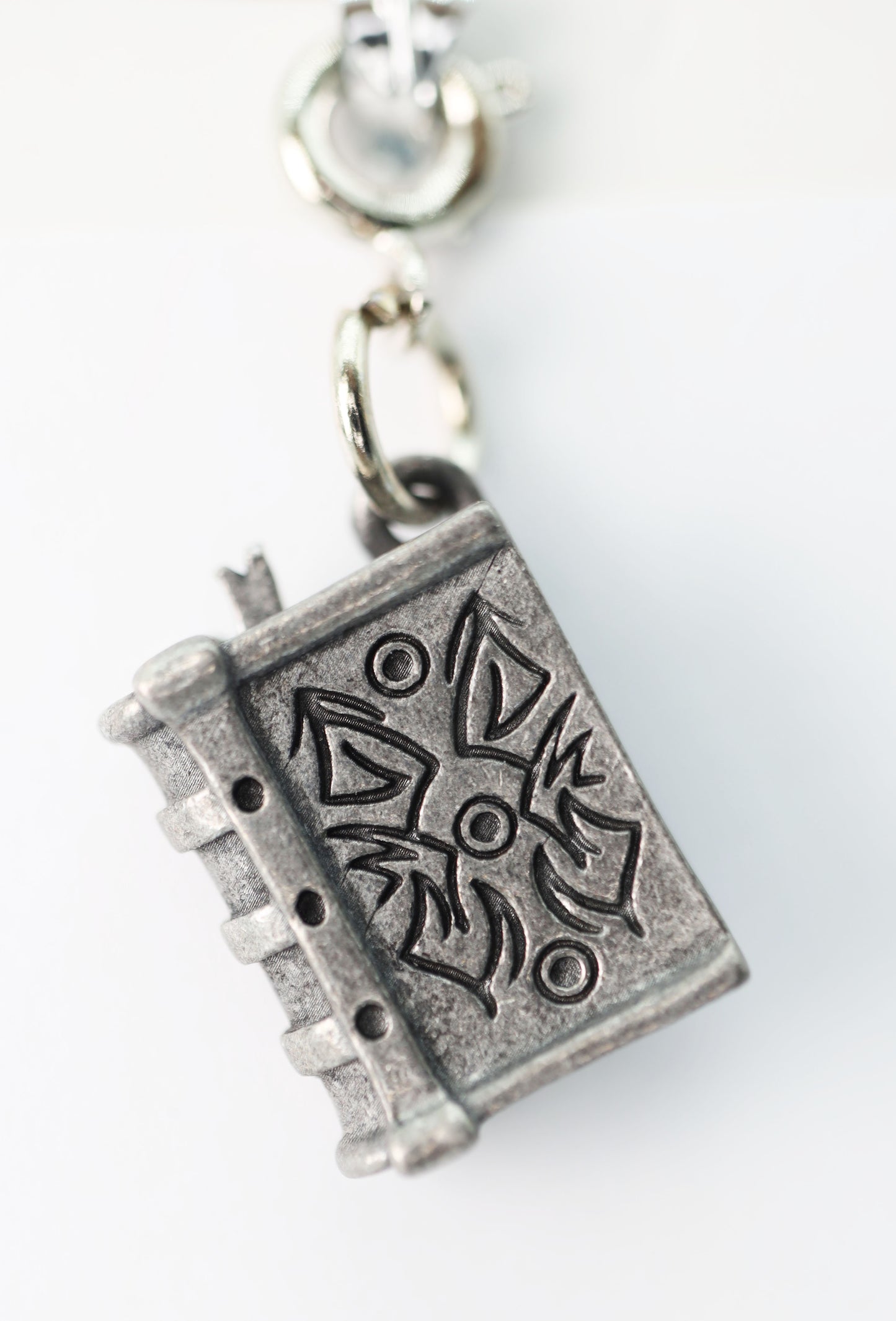 Traveler's Trinkets - Tome Charm - Game On